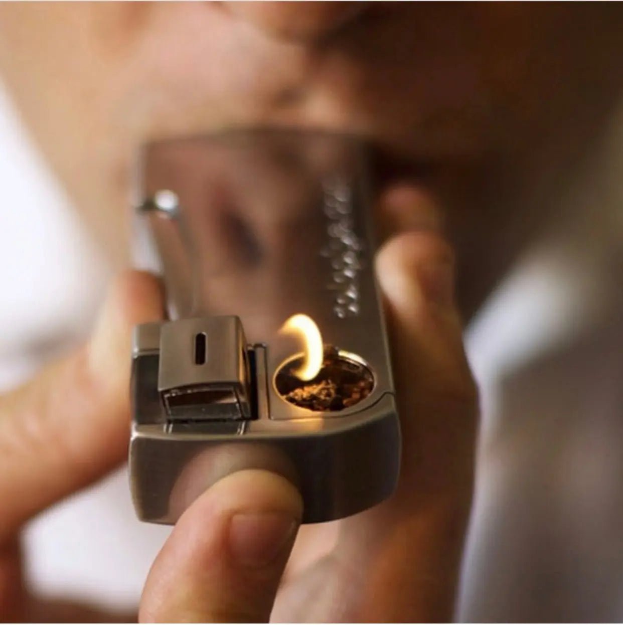 Close-up of Solopipe sliding bowl cover and metallic body